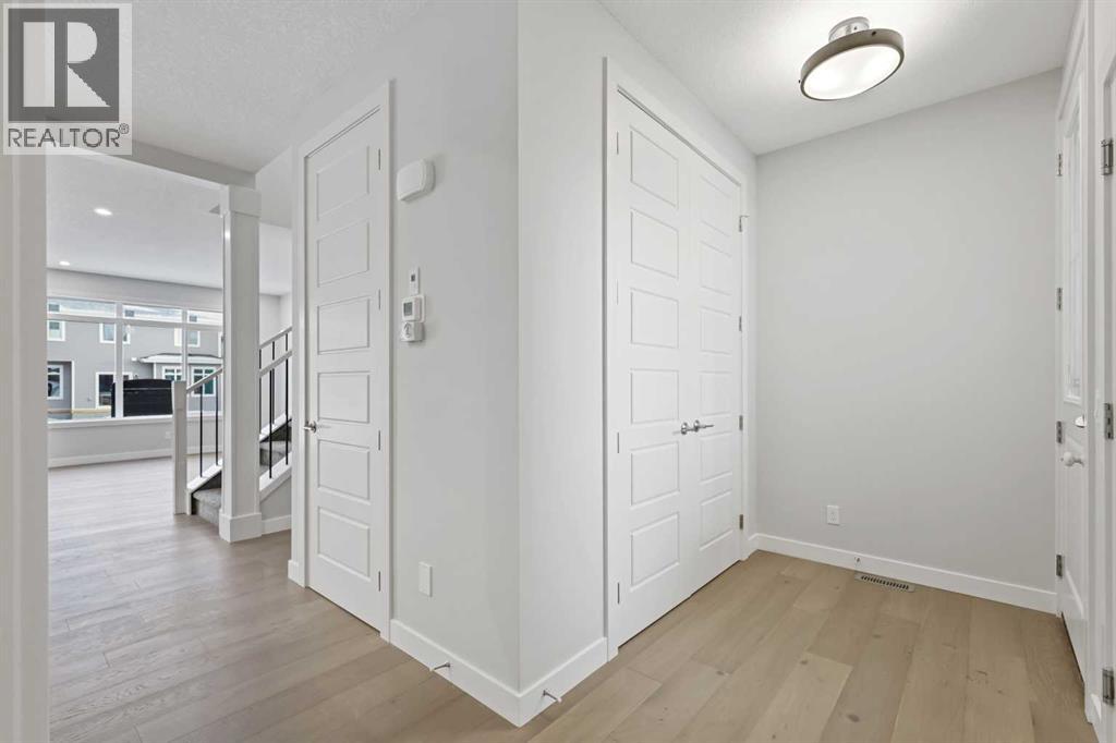 8 Topaz Place, Cochrane, Alberta  T4C 3K2 - Photo 2 - A2283082