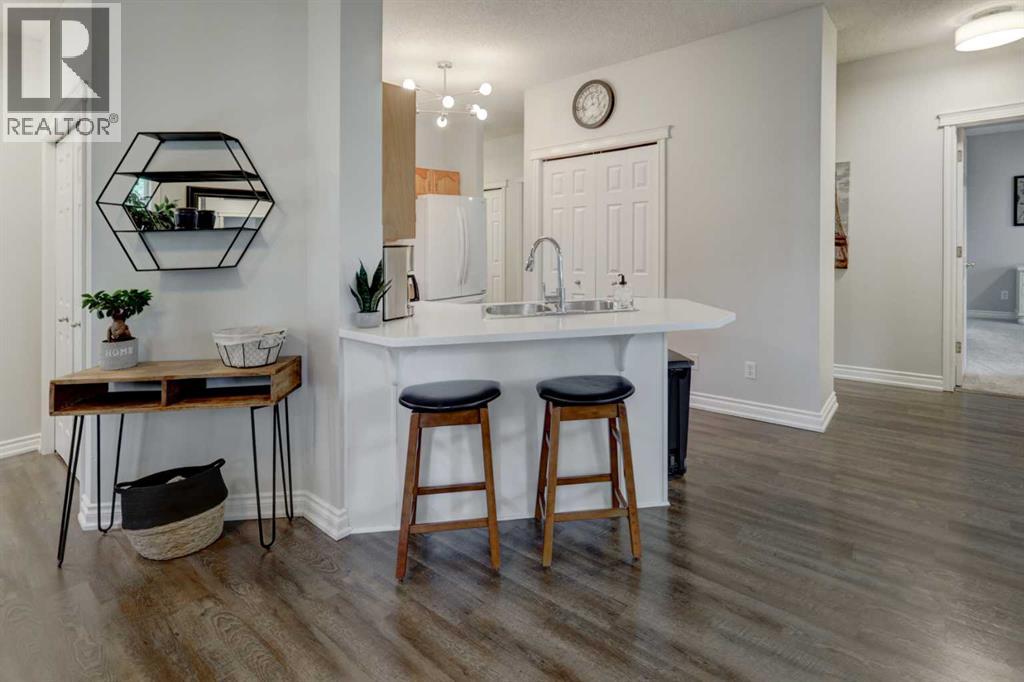 102, 39 Hidden Creek Place NW, Calgary, Alberta  T3A 6B9 - Photo 3 - A2336425