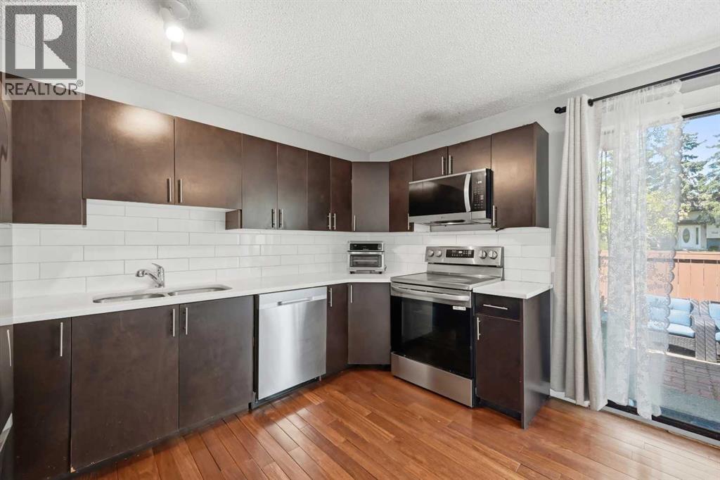 11, 1155 Falconridge Drive NE, Calgary, Alberta  T3J 1E1 - Photo 6 - A2318172