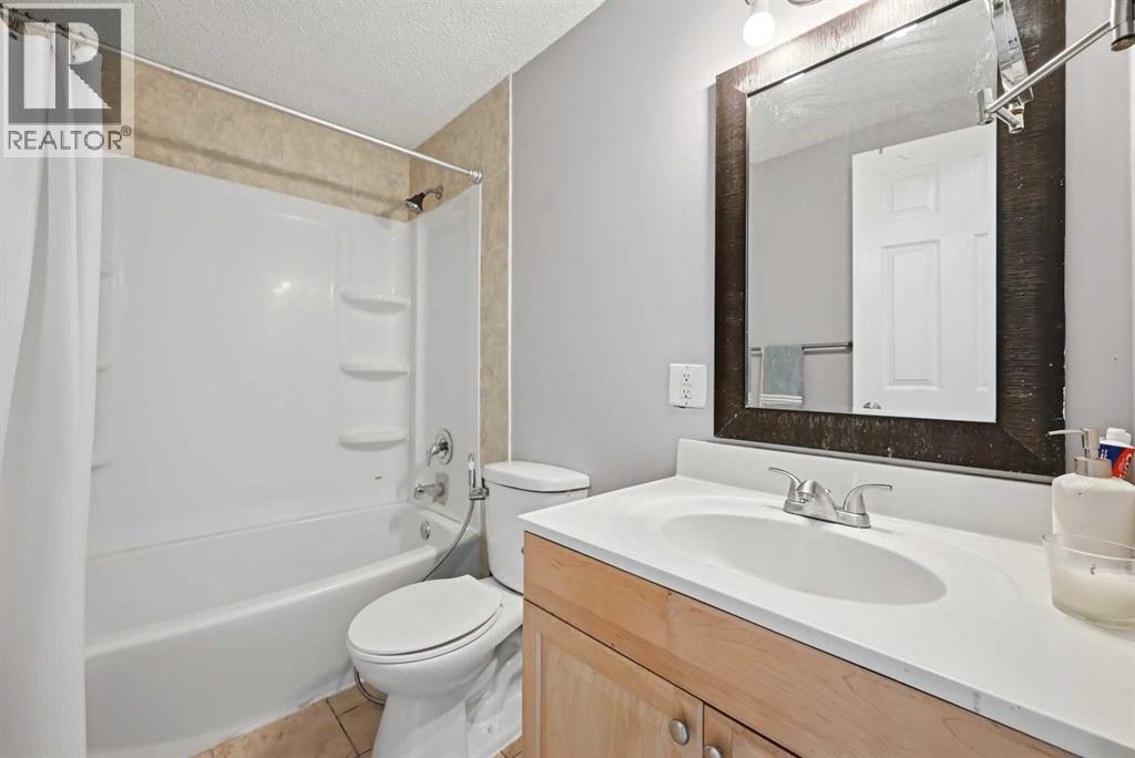 11, 1155 Falconridge Drive NE, Calgary, Alberta  T3J 1E1 - Photo 12 - A2318172