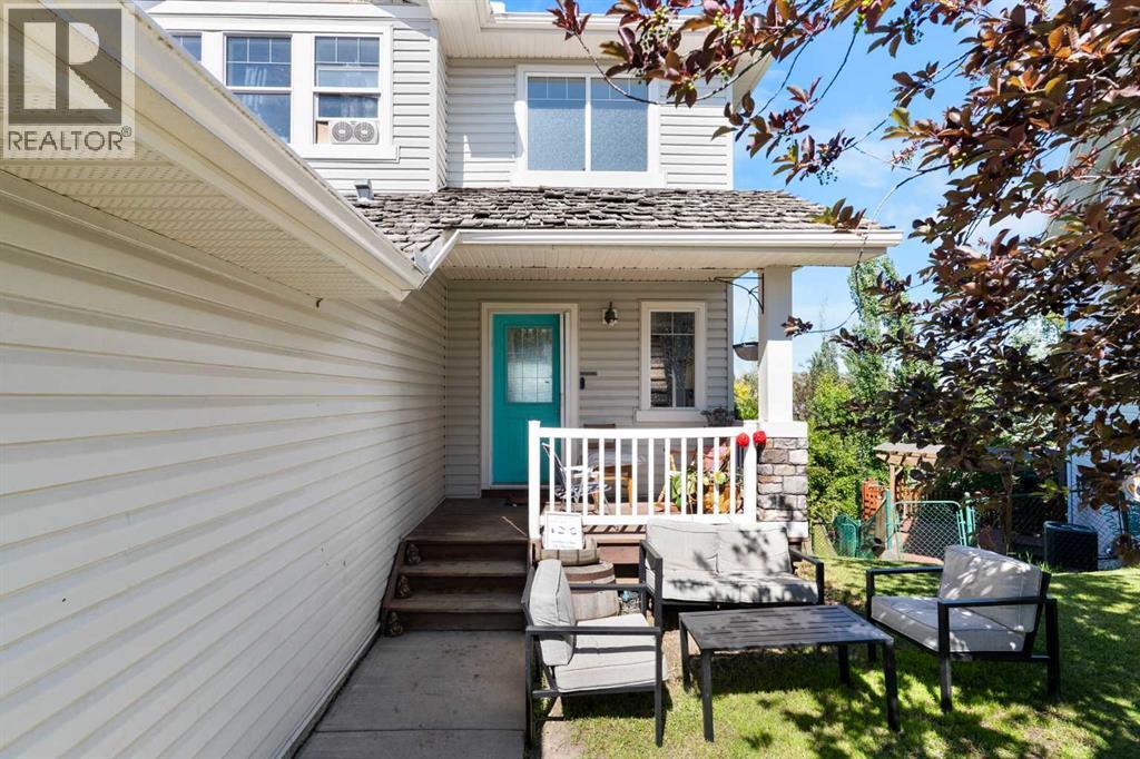 151 Bow Ridge Crescent, Cochrane, Alberta  T4C 1V2 - Photo 2 - A2327661