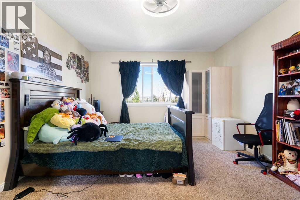 151 Bow Ridge Crescent, Cochrane, Alberta  T4C 1V2 - Photo 25 - A2327661