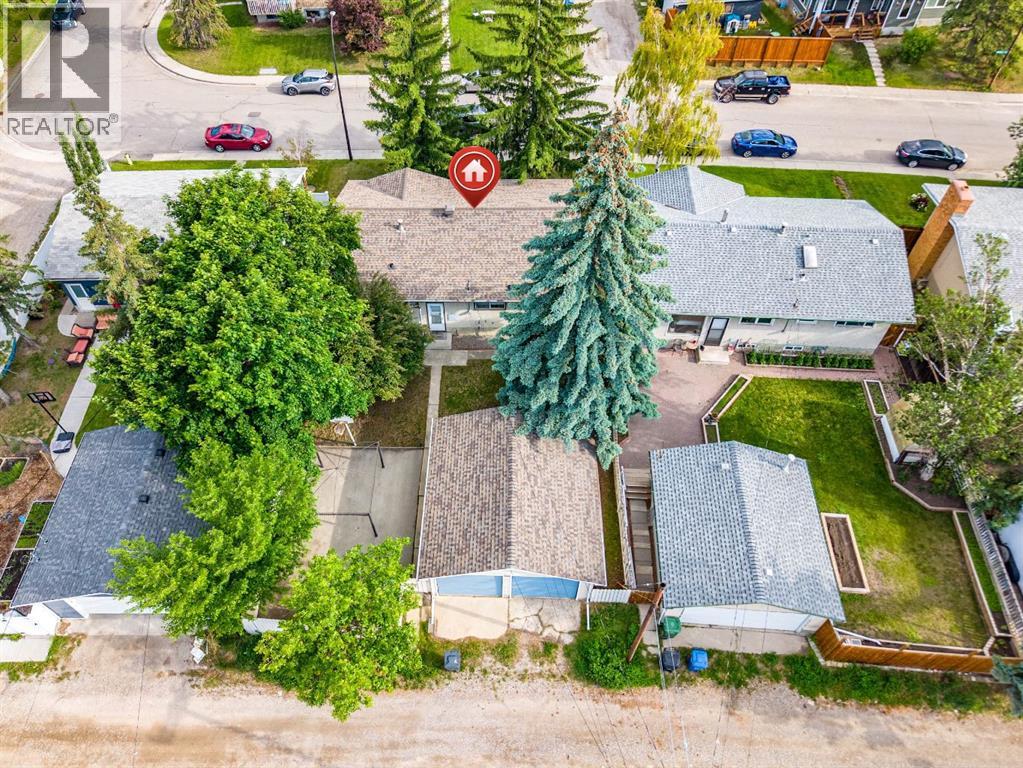7511 Huntridge Crescent Ne, Calgary, Alberta  T2K 4C8 - Photo 40 - A2323516