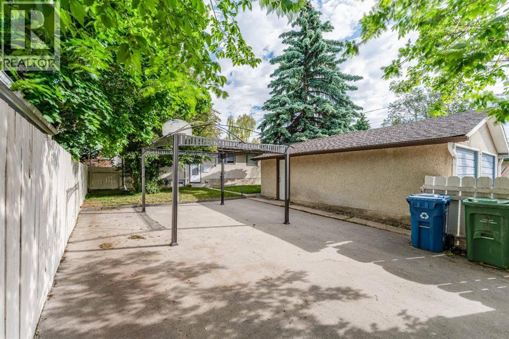 7511 Huntridge Crescent Ne, Calgary, Alberta  T2K 4C8 - Photo 37 - A2323516