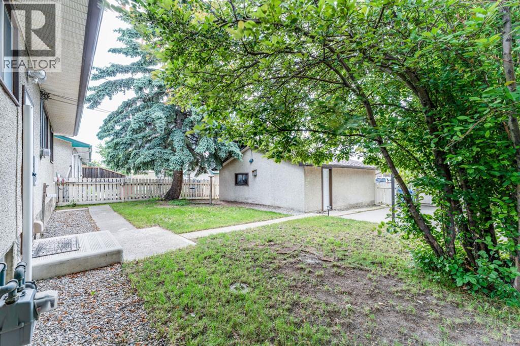 7511 Huntridge Crescent Ne, Calgary, Alberta  T2K 4C8 - Photo 39 - A2323516