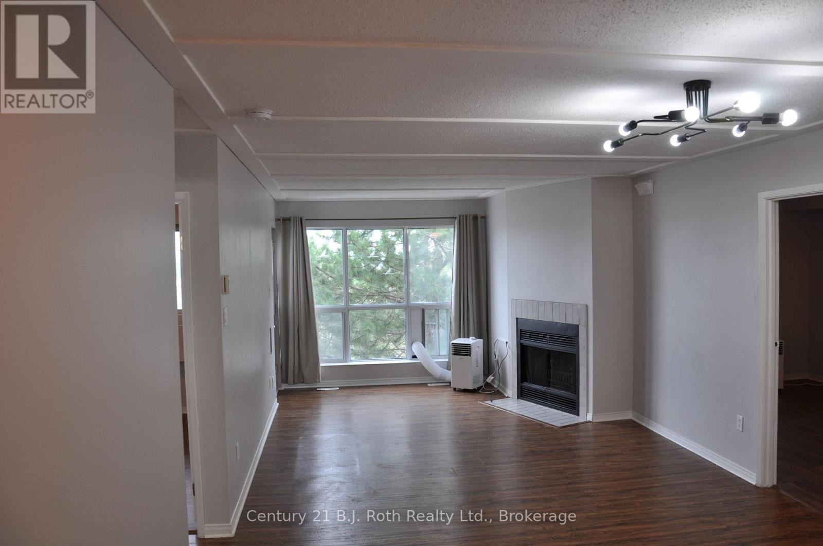 416 - 126 Bell Farm Road, Barrie (Alliance), Ontario  L4M 6J3 - Photo 2 - S13686152