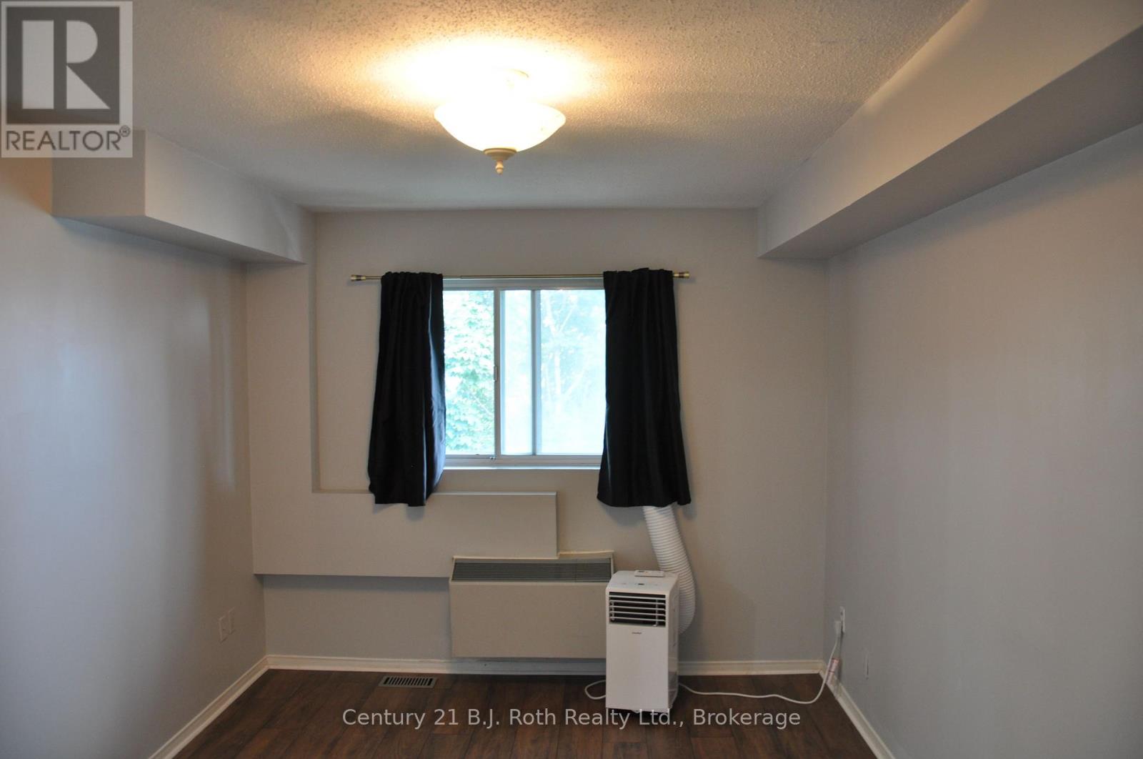 416 - 126 Bell Farm Road, Barrie (Alliance), Ontario  L4M 6J3 - Photo 5 - S13686152