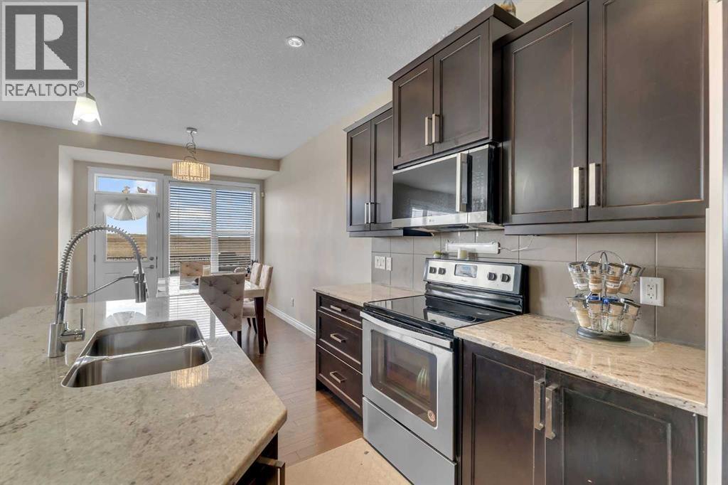 288 Evansborough Way NW, Calgary, Alberta  T3P 0R1 - Photo 11 - A2337499