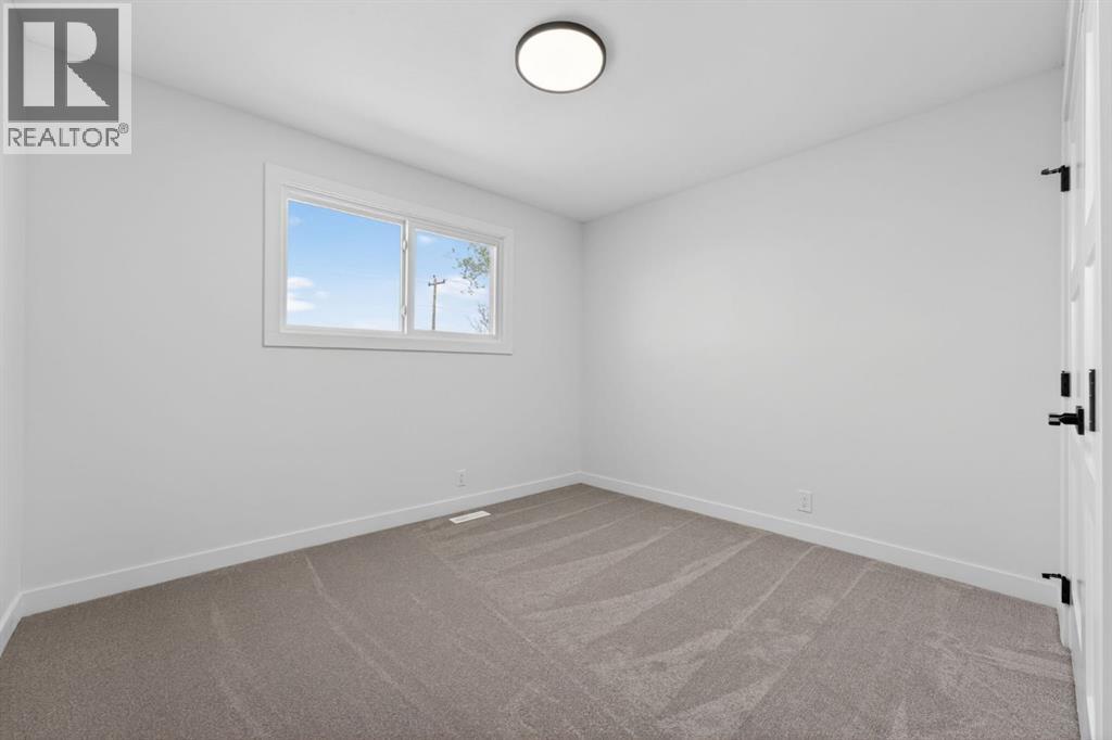 40 Bernard Way NW, Calgary, Alberta  T3K 2E9 - Photo 25 - A2330085