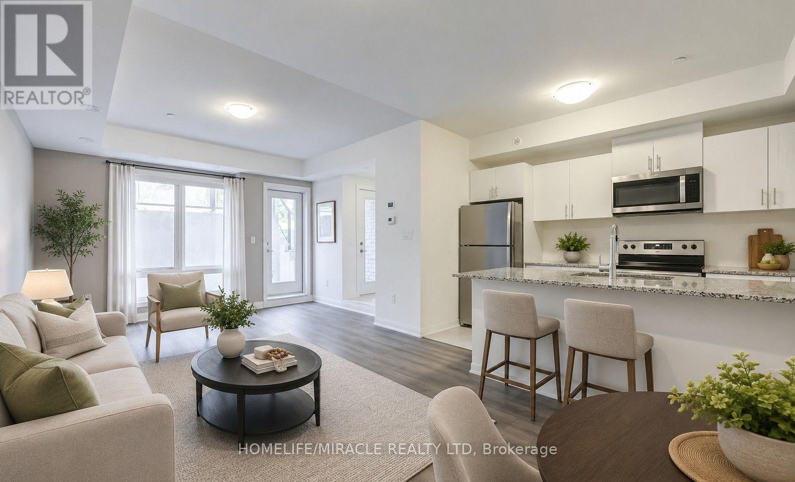 8 - 145 Tapscott Road, Toronto, Ontario  M1B 0E8 - Photo 2 - E13687334