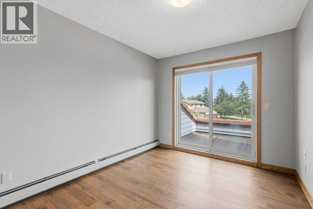 119 Strathbury Bay Sw, Calgary, Alberta  T3H 1N3 - Photo 20 - A2336449