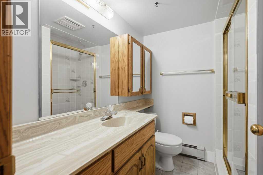 119 Strathbury Bay Sw, Calgary, Alberta  T3H 1N3 - Photo 28 - A2336449