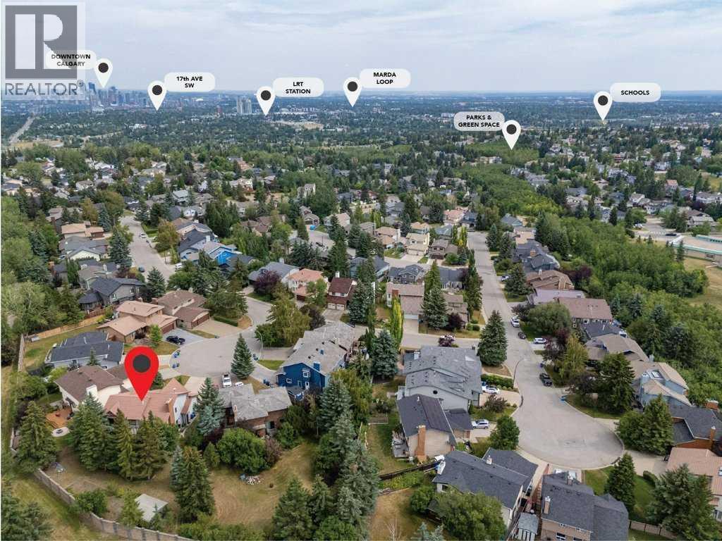 119 Strathbury Bay Sw, Calgary, Alberta  T3H 1N3 - Photo 39 - A2336449