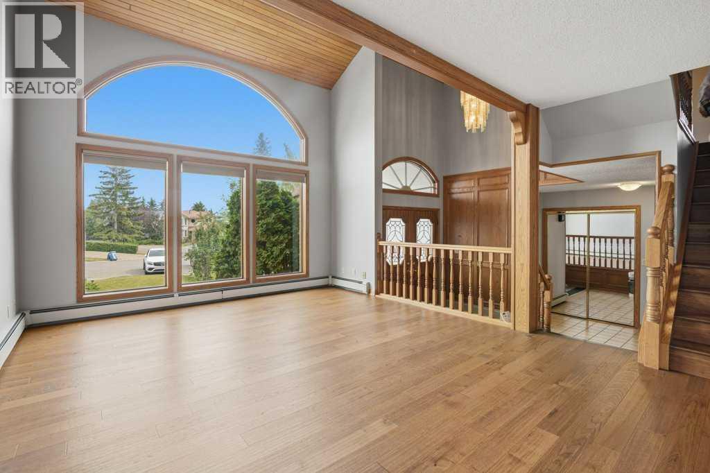 119 Strathbury Bay Sw, Calgary, Alberta  T3H 1N3 - Photo 3 - A2336449