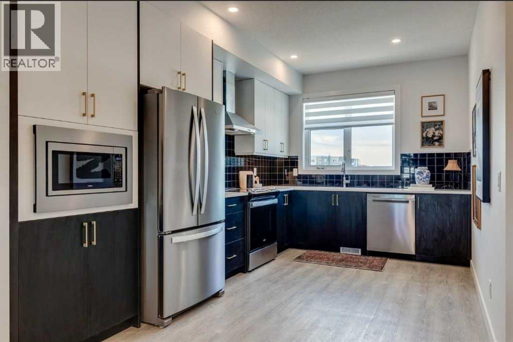 414, 8235 8 Avenue SW, Calgary, Alberta  T3H 6H2 - Photo 4 - A2338132