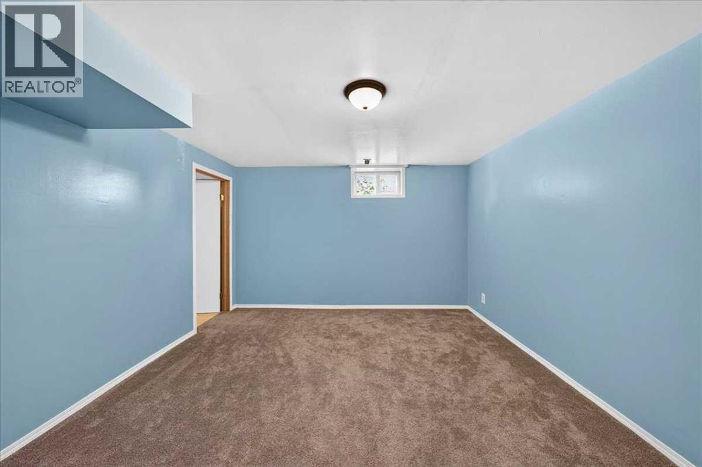 1837 Meadowbrook Drive SE, Airdrie, Alberta  T4A 1V5 - Photo 47 - A2336263