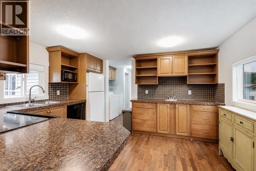56 Spring Dale Circle SE, Airdrie, Alberta  T4A 1p2 - Photo 3 - A2337919