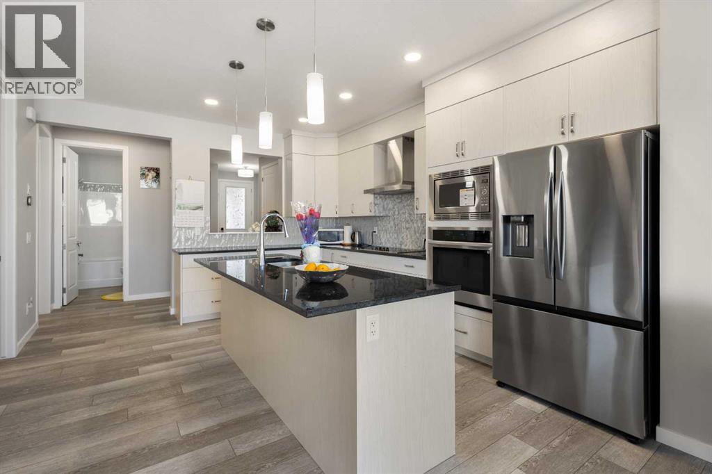 35 Lucas Passage NW, Calgary, Alberta  T3P 2E3 - Photo 6 - A2325071