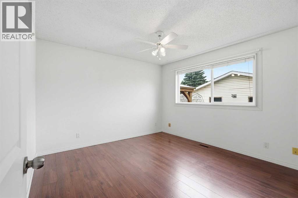 251 Erin Woods Drive SE, Calgary, Alberta  T2Z 2V8 - Photo 17 - A2337046