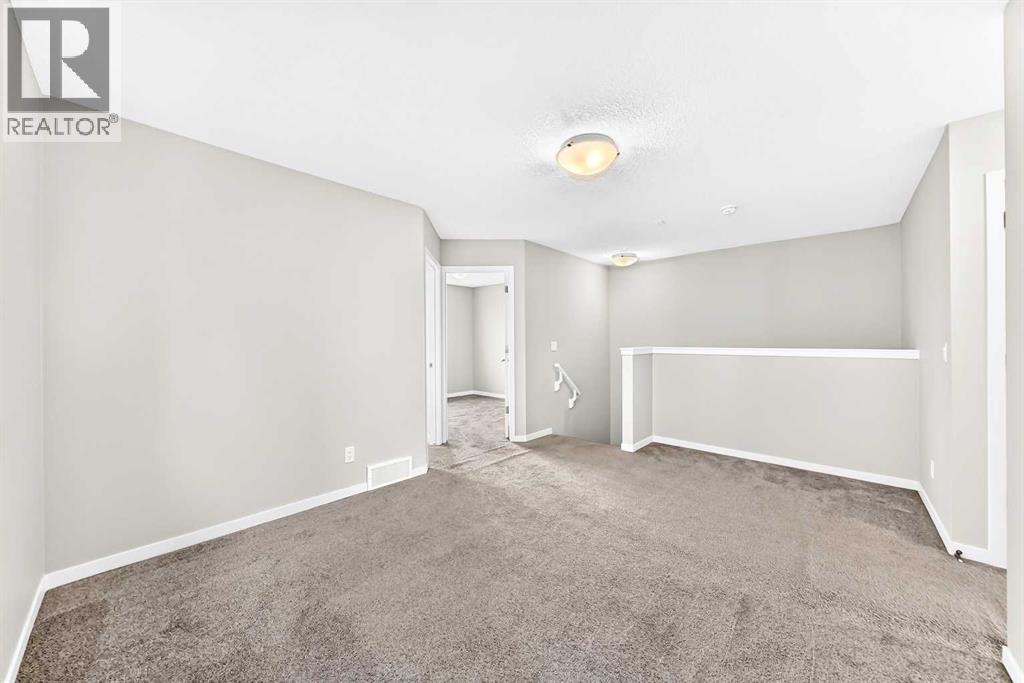 18 Willow Crescent, Okotoks, Alberta  T1S 5S2 - Photo 31 - A2337291