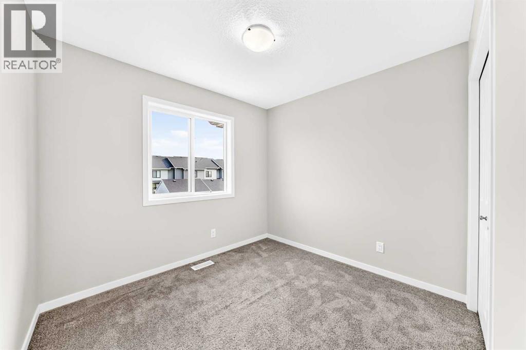 18 Willow Crescent, Okotoks, Alberta  T1S 5S2 - Photo 24 - A2337291