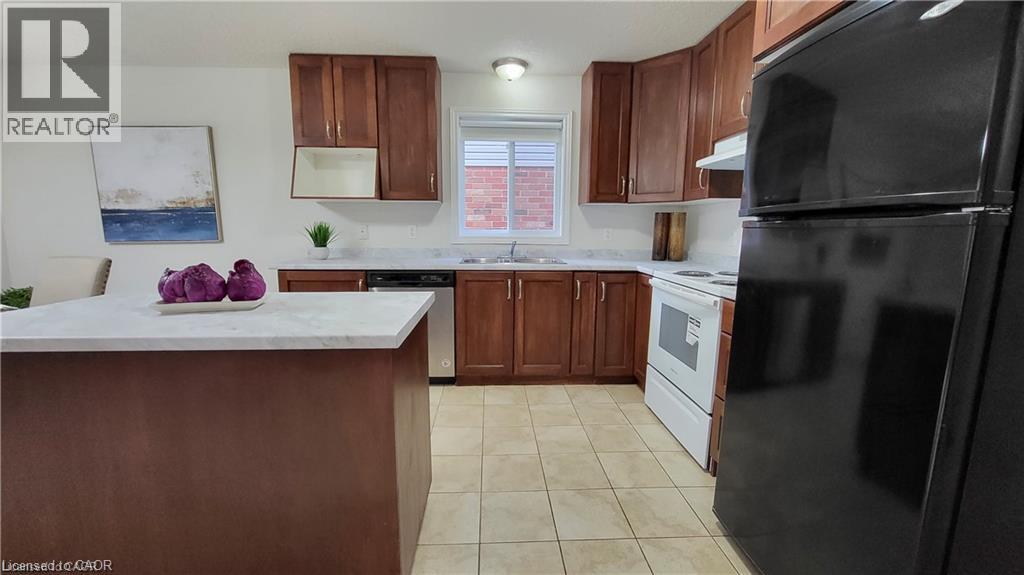 128 Udvari Crescent Unit# A, Kitchener, Ontario  N2N 3P6 - Photo 5 - 40856389