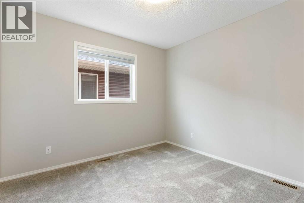 16 Fireside Way, Cochrane, Alberta  T4C 0R1 - Photo 32 - A2336797