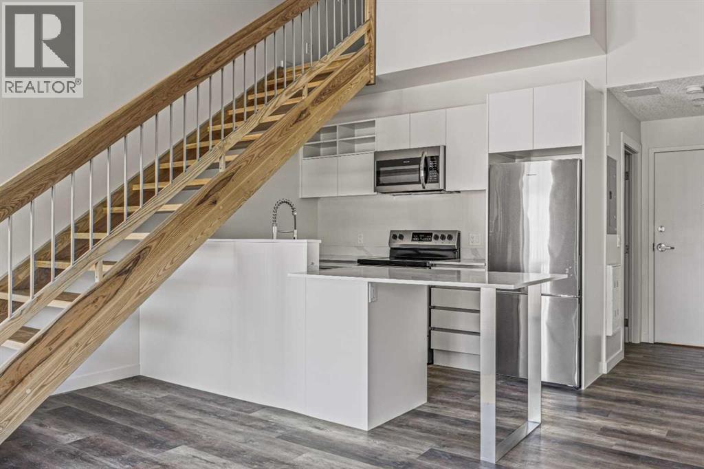 205b, 1 Industrial Place, Canmore, Alberta  T1W 1Y1 - Photo 3 - A2316428