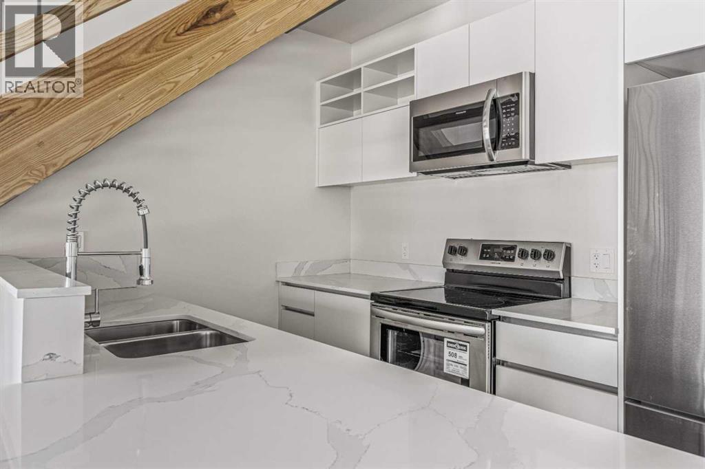 205b, 1 Industrial Place, Canmore, Alberta  T1W 1Y1 - Photo 4 - A2316428