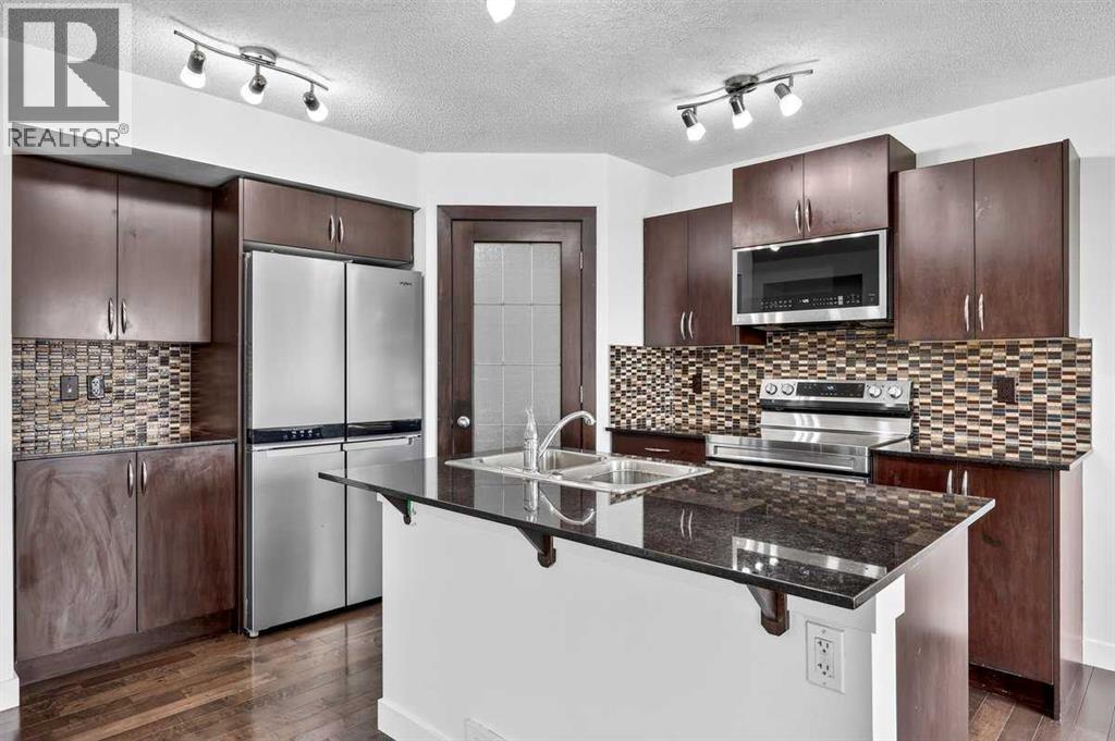 377 Panora Way Nw, Calgary, Alberta  T3K 0V2 - Photo 12 - A2335904