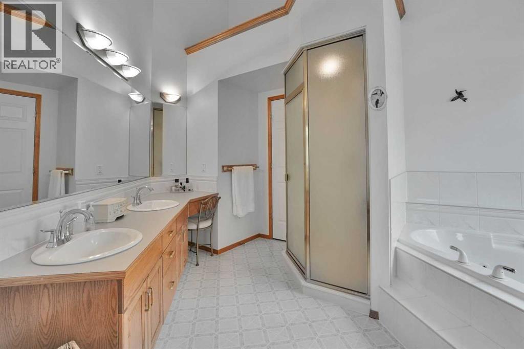 82 Valley Ridge Point Nw, Calgary, Alberta  T3B 5A7 - Photo 20 - A2309791