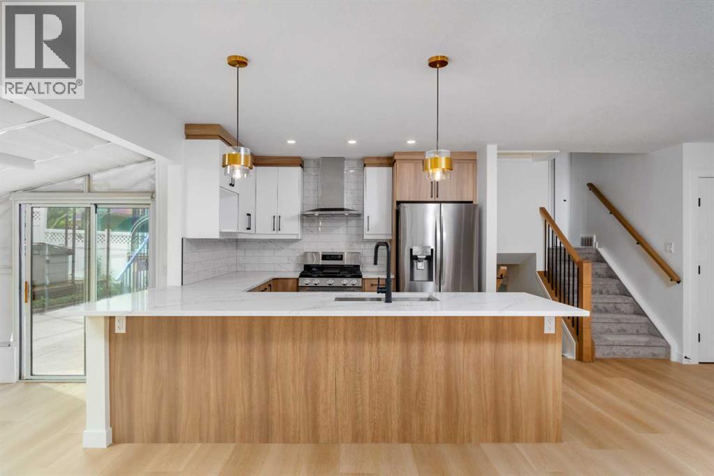 312 Queensland Road SE, Calgary, Alberta  T2J 3S6 - Photo 2 - A2316310