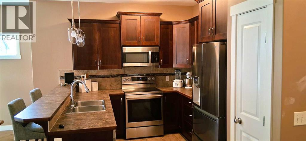 301 Ranch Ridge Meadow, Strathmore, Alberta  T1P 0A9 - Photo 6 - A2337477