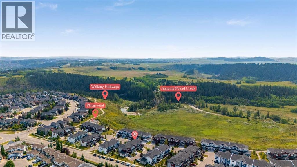 304 Jumping Pound Common, Cochrane, Alberta  T4C 2L1 - Photo 4 - A2338004