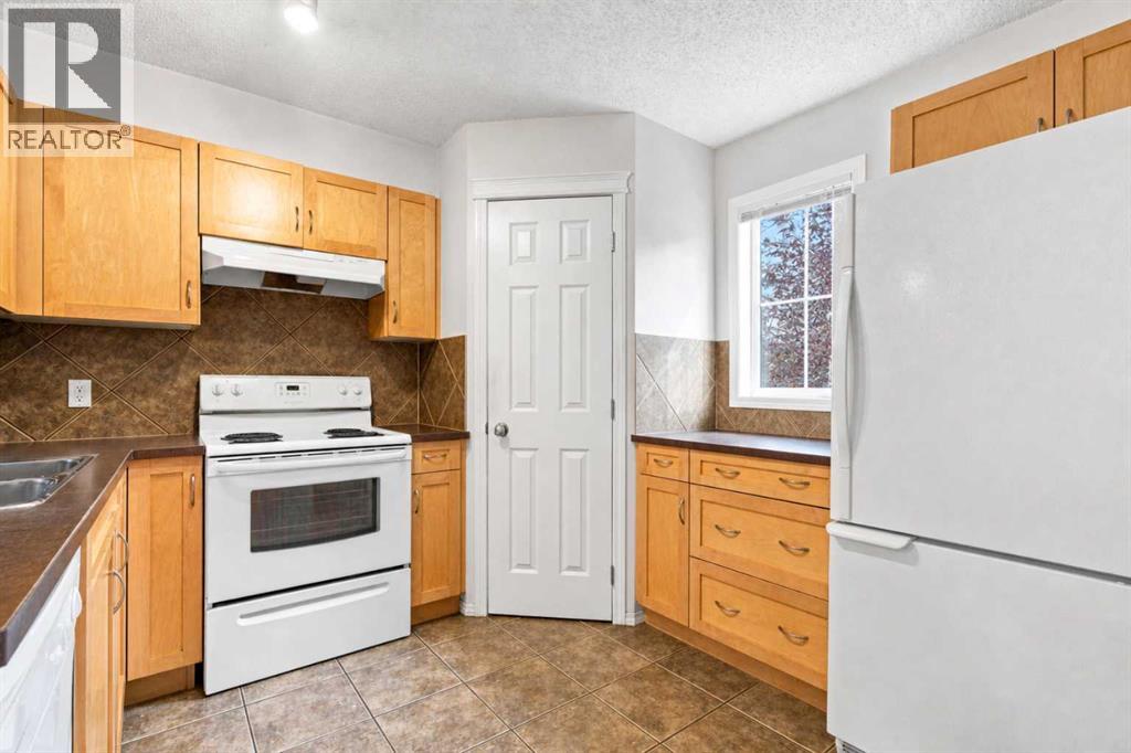 106 Panamount Drive NW, Calgary, Alberta  T3K 6K3 - Photo 6 - A2338019
