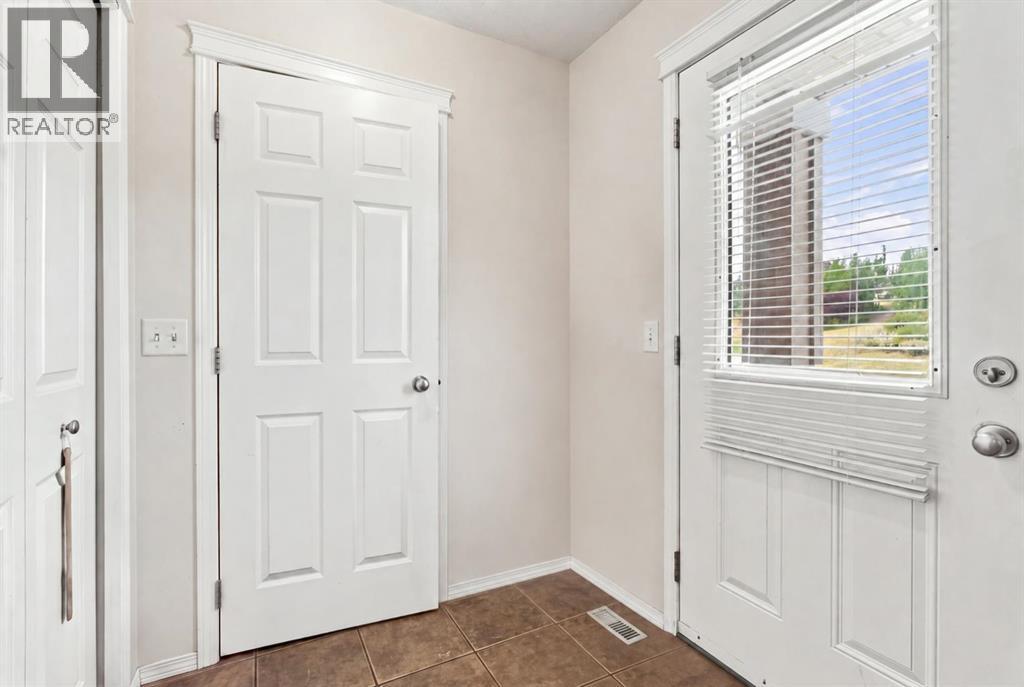 106 Panamount Drive NW, Calgary, Alberta  T3K 6K3 - Photo 3 - A2338019