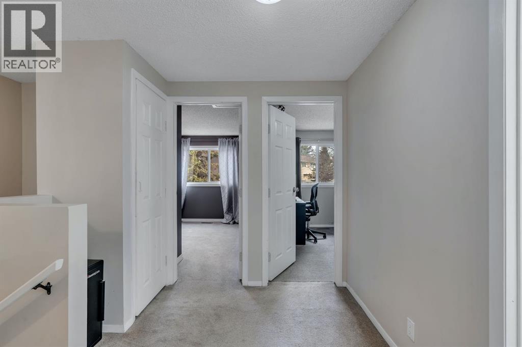 174 Woodmont Terrace SW, Calgary, Alberta T2W 4Z4 - Photo 11 - A2338075