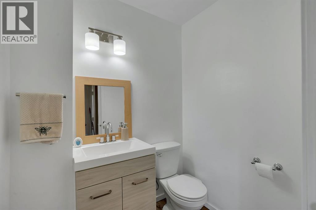 174 Woodmont Terrace SW, Calgary, Alberta T2W 4Z4 - Photo 14 - A2338075