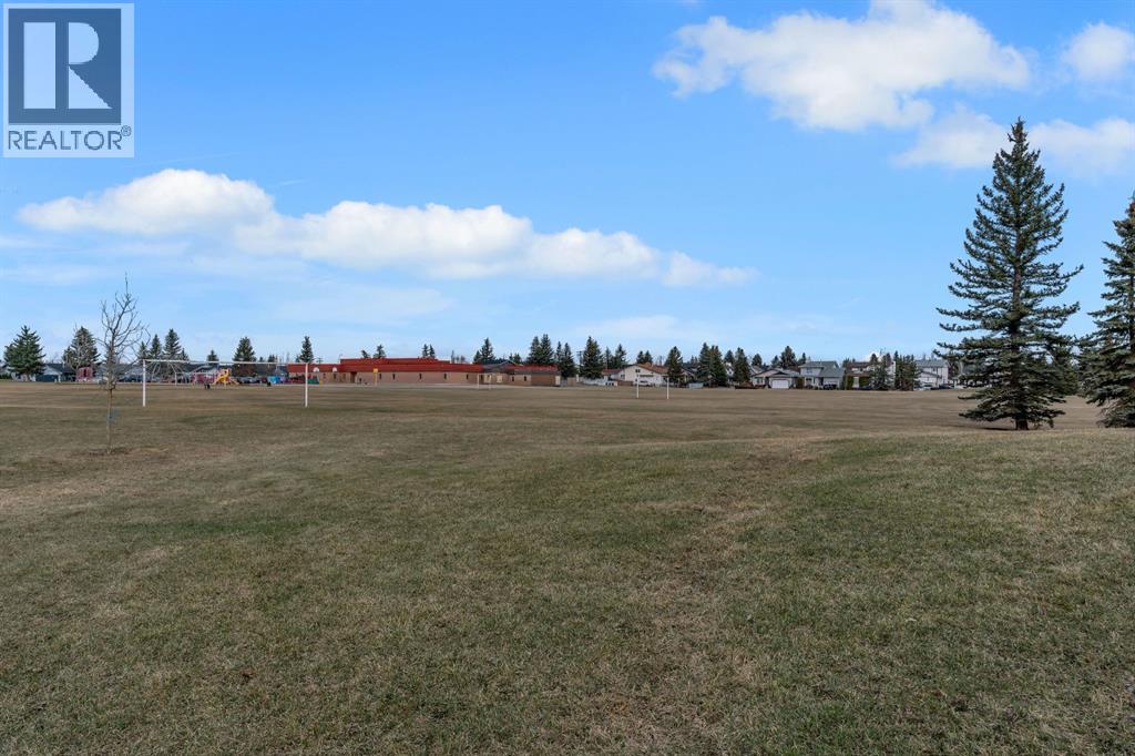 174 Woodmont Terrace SW, Calgary, Alberta T2W 4Z4 - Photo 23 - A2338075