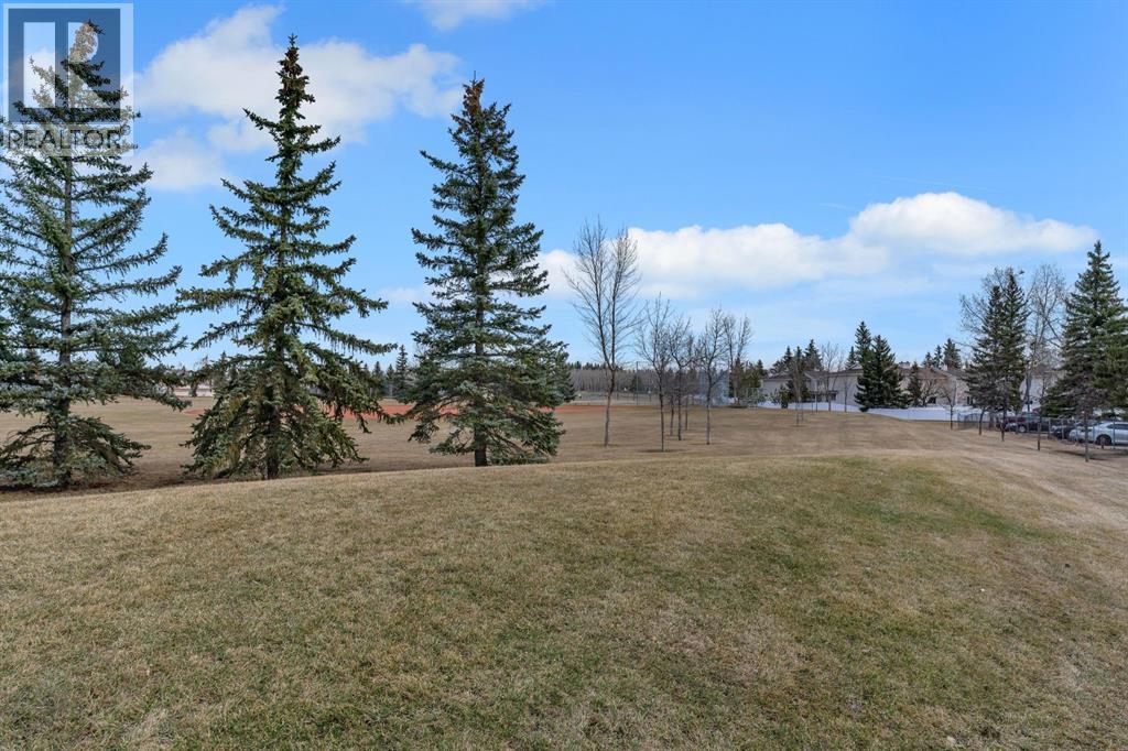 174 Woodmont Terrace SW, Calgary, Alberta T2W 4Z4 - Photo 24 - A2338075