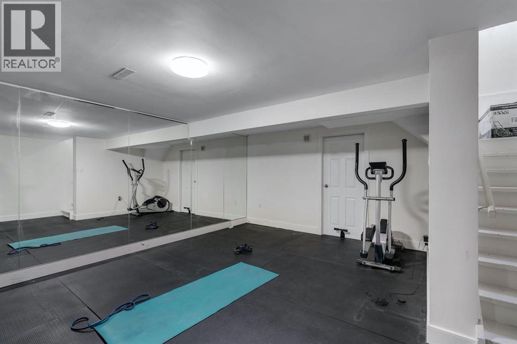 174 Woodmont Terrace SW, Calgary, Alberta T2W 4Z4 - Photo 17 - A2338075