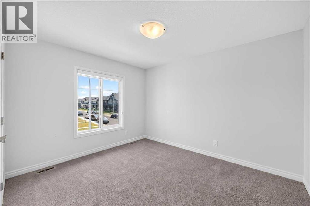 75 Midgrove Drive SW, Airdrie, Alberta  T4B 5K7 - Photo 36 - A2322777