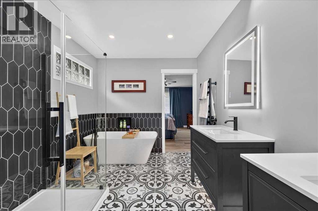 212 Cresthaven Place SW, Calgary, Alberta  T3B 5W4 - Photo 5 - A2337136