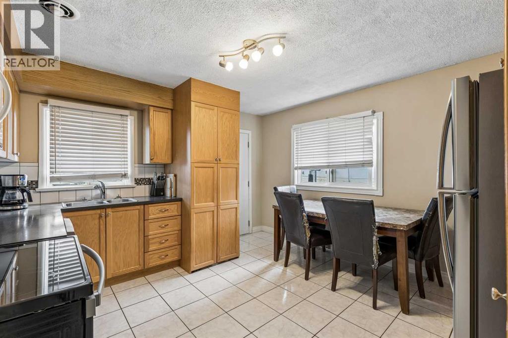 1232 Danloe Street NE, Calgary, Alberta  T2E 8X6 - Photo 7 - A2321390