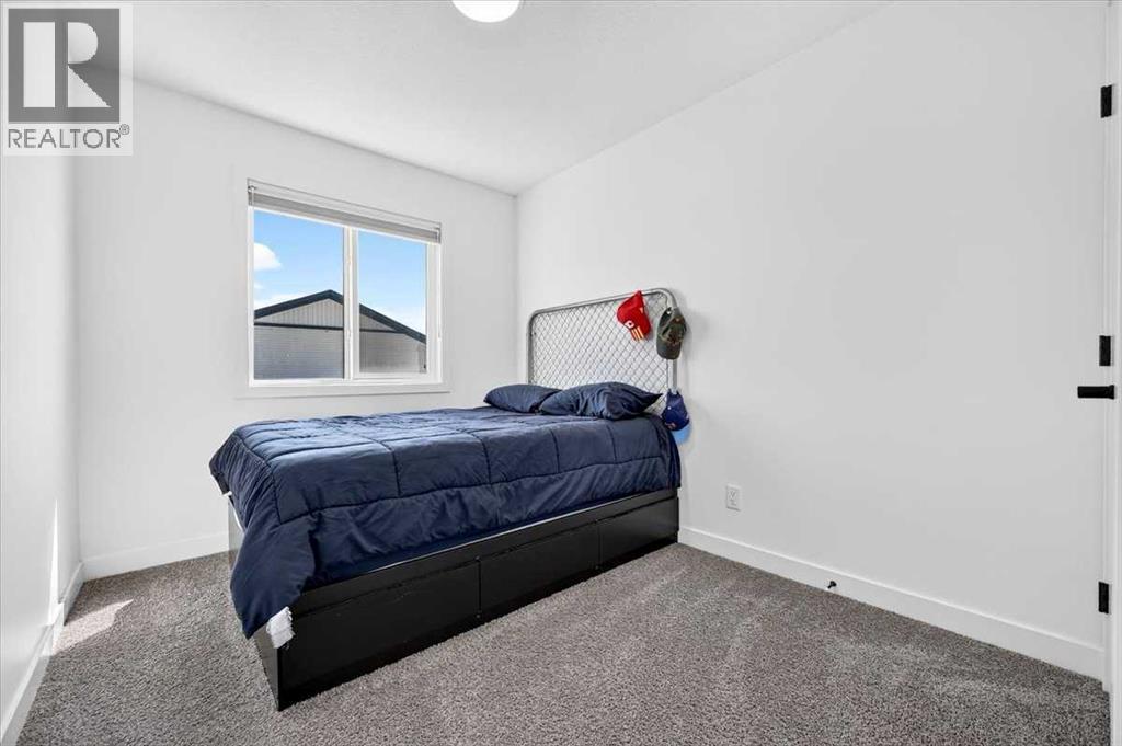 40 Amblefield View NW, Calgary, Alberta  T3P 2B9 - Photo 25 - A2333810