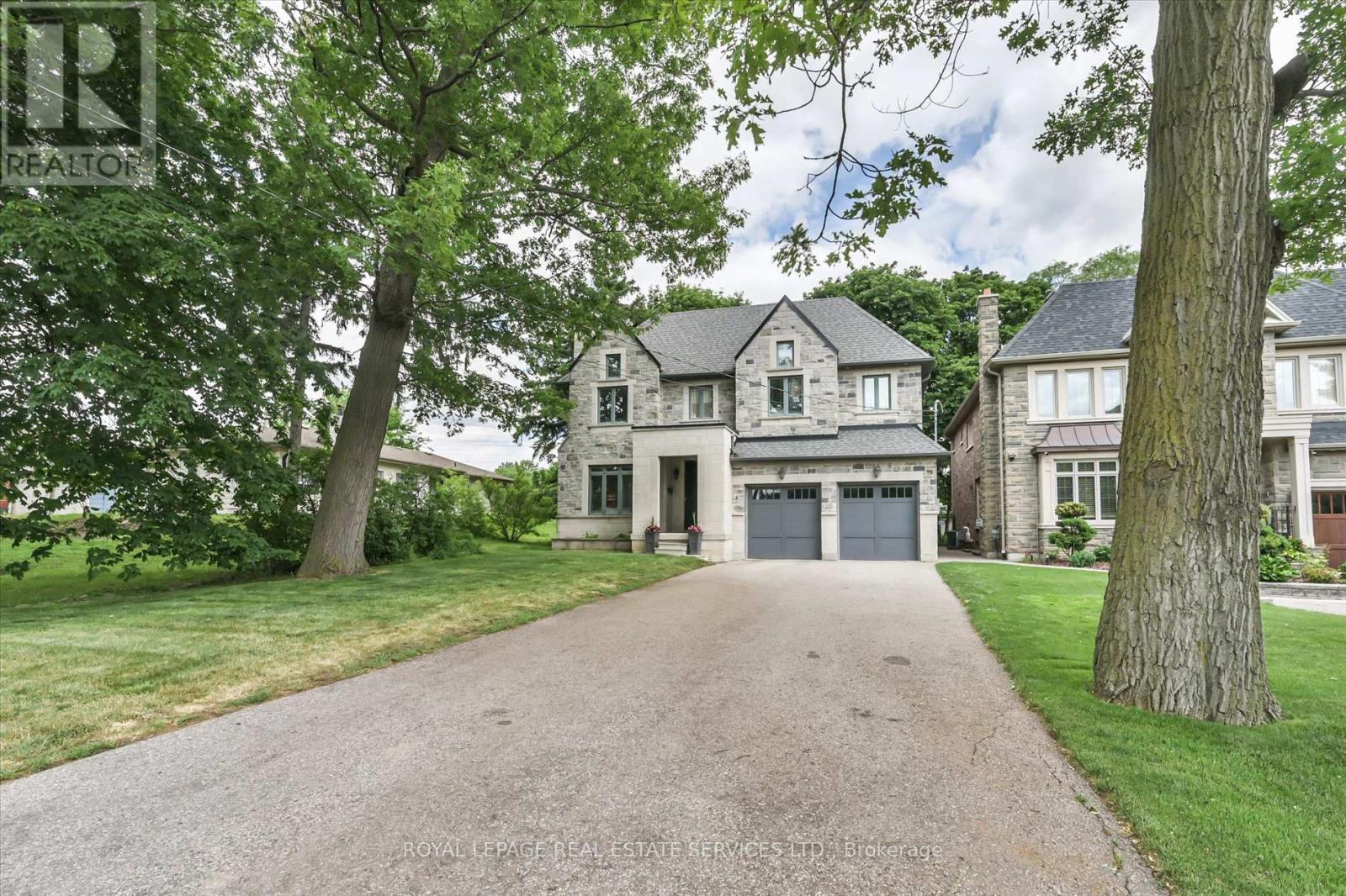 <div class="slider-price">$2,499,900</div><p>439 Martin Grove Road, Toronto, Ontario</p>