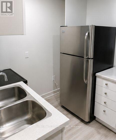 1659 Gerrard Street E, Toronto, Ontario  M4L 2A9 - Photo 11 - E13689614