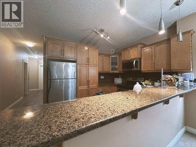 102, 110 12 Avenue Ne, Calgary, Alberta T2E 0Z9 - Photo 5 - A2309742