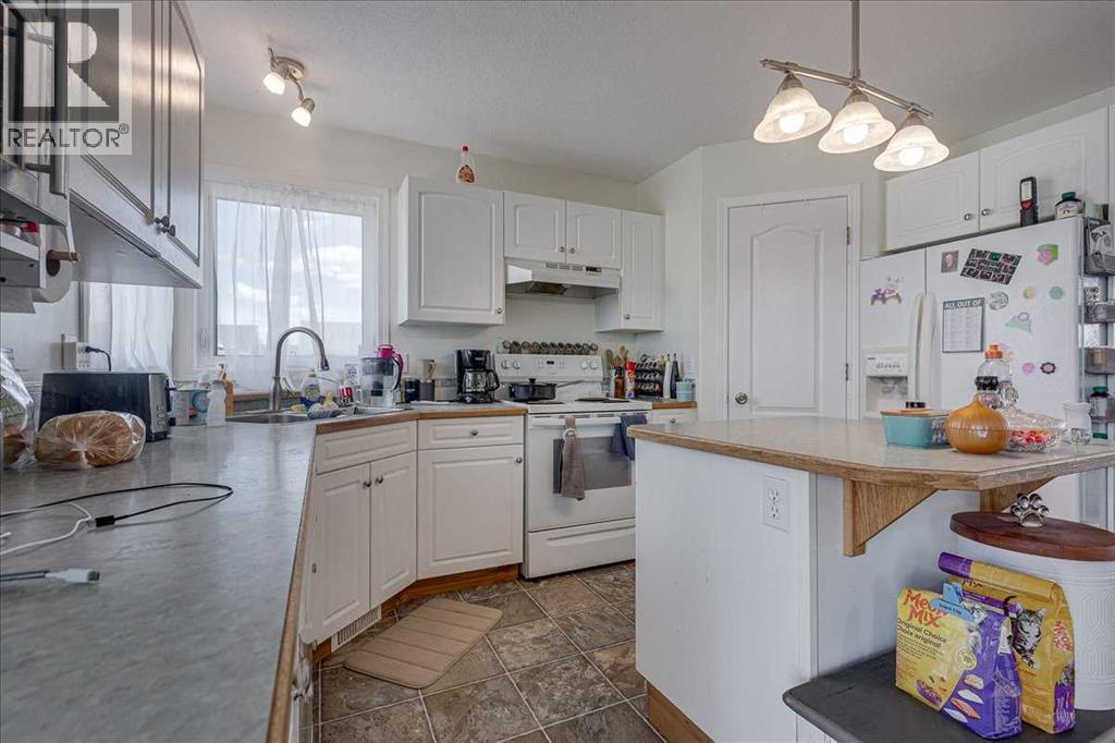 4 Harrison Road, Sylvan Lake, Alberta  T4S 1T4 - Photo 12 - A2312112