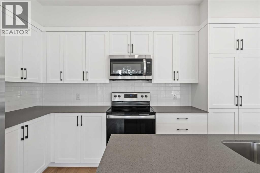 79 Eston Lane SE, Calgary, Alberta  T2A 0M8 - Photo 10 - A2309612